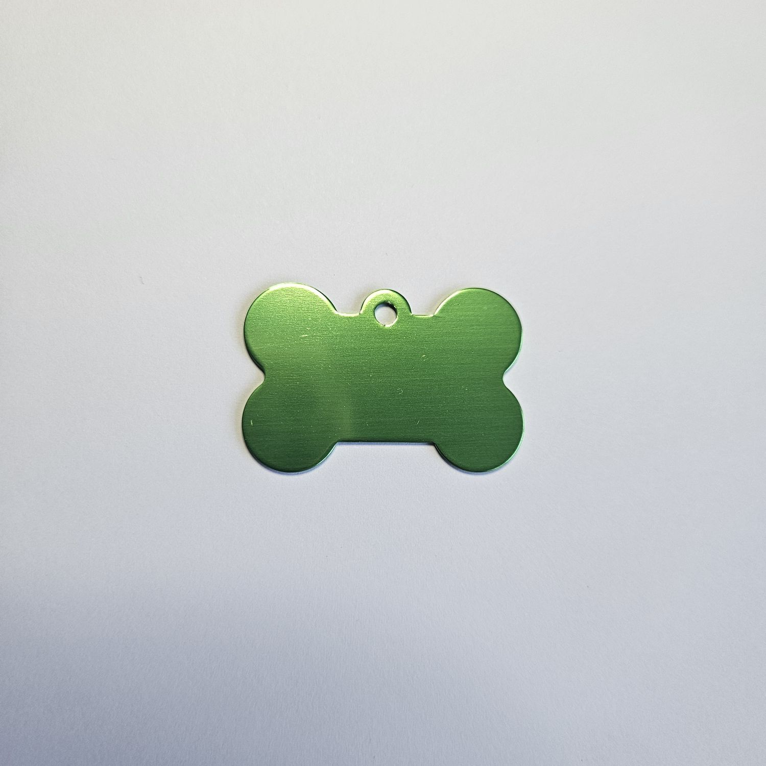 Schlüsselanhänger /  Hundemarke in Knochenform, inklusive Lasergravur und Schlüsselring