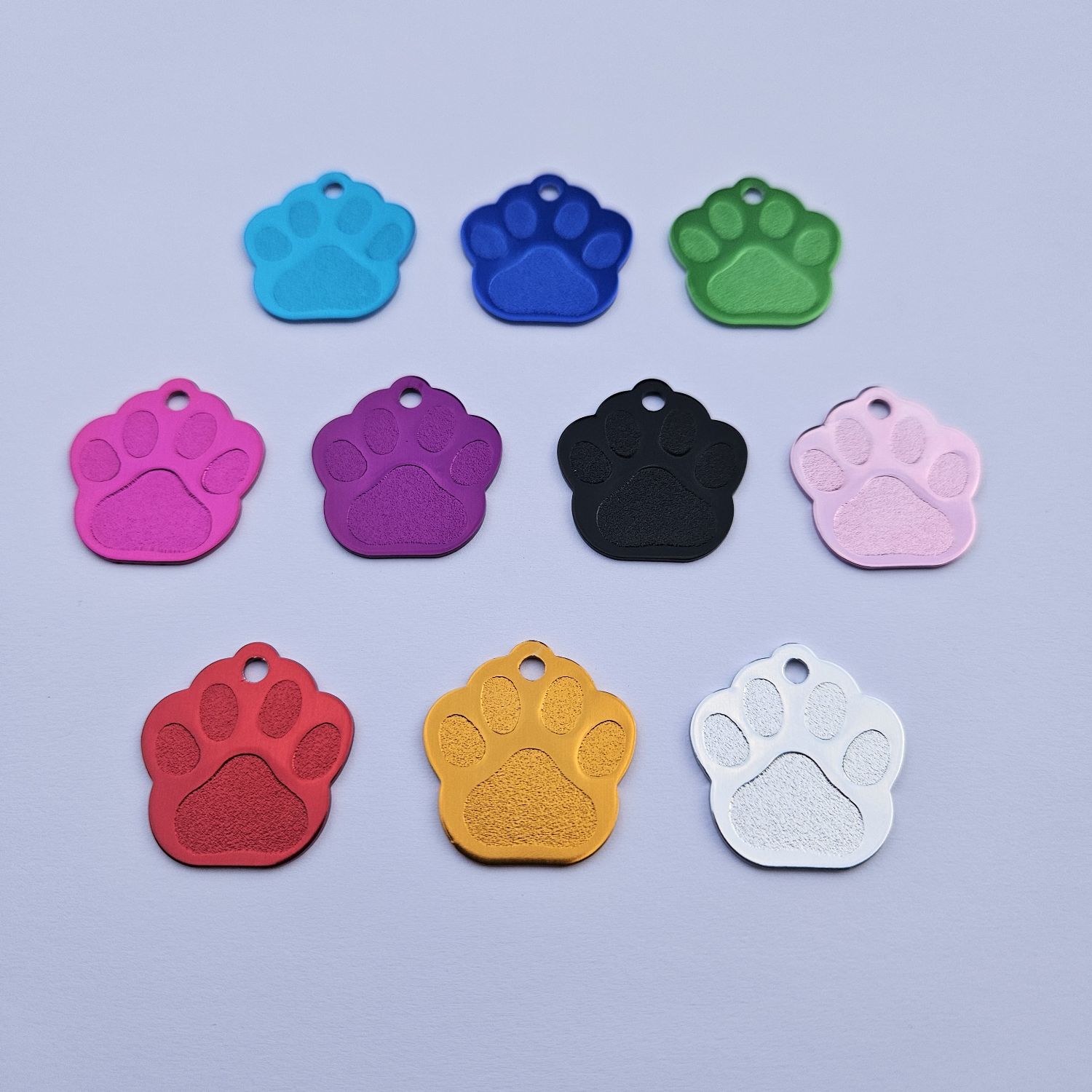 Schlüsselanhänger /  Hundemarke in Pfotenform, inklusive Lasergravur und Schlüsselring